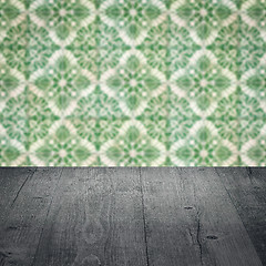 Image showing Wood table top and blur vintage ceramic tile pattern wall