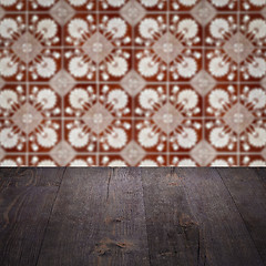 Image showing Wood table top and blur vintage ceramic tile pattern wall