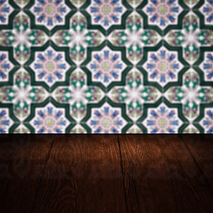 Image showing Wood table top and blur vintage ceramic tile pattern wall