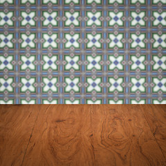 Image showing Wood table top and blur vintage ceramic tile pattern wall