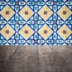 Image showing Wood table top and blur vintage ceramic tile pattern wall