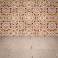 Image showing Wood table top and blur vintage ceramic tile pattern wall