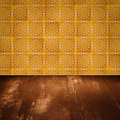 Image showing Wood table top and blur vintage ceramic tile pattern wall