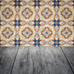 Image showing Wood table top and blur vintage ceramic tile pattern wall