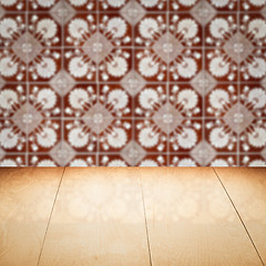 Image showing Wood table top and blur vintage ceramic tile pattern wall