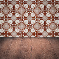 Image showing Wood table top and blur vintage ceramic tile pattern wall