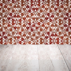 Image showing Wood table top and blur vintage ceramic tile pattern wall