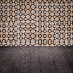 Image showing Wood table top and blur vintage ceramic tile pattern wall