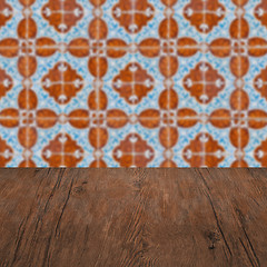 Image showing Wood table top and blur vintage ceramic tile pattern wall