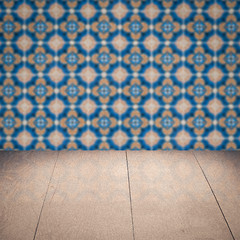 Image showing Wood table top and blur vintage ceramic tile pattern wall