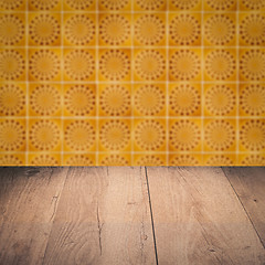 Image showing Wood table top and blur vintage ceramic tile pattern wall