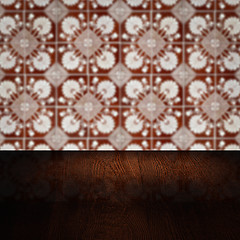 Image showing Wood table top and blur vintage ceramic tile pattern wall