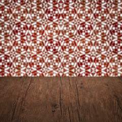 Image showing Wood table top and blur vintage ceramic tile pattern wall