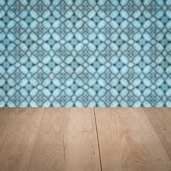 Image showing Wood table top and blur vintage ceramic tile pattern wall