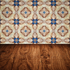 Image showing Wood table top and blur vintage ceramic tile pattern wall