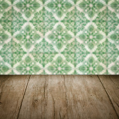 Image showing Wood table top and blur vintage ceramic tile pattern wall