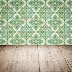 Image showing Wood table top and blur vintage ceramic tile pattern wall