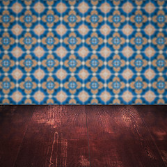 Image showing Wood table top and blur vintage ceramic tile pattern wall