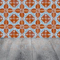 Image showing Wood table top and blur vintage ceramic tile pattern wall