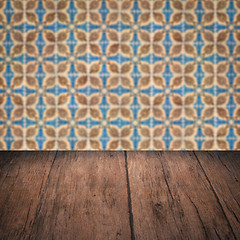 Image showing Wood table top and blur vintage ceramic tile pattern wall