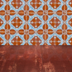 Image showing Wood table top and blur vintage ceramic tile pattern wall