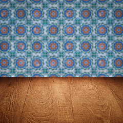 Image showing Wood table top and blur vintage ceramic tile pattern wall