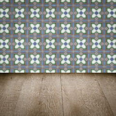 Image showing Wood table top and blur vintage ceramic tile pattern wall