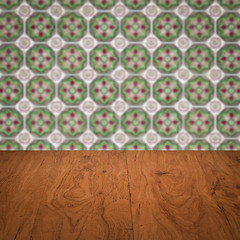 Image showing Wood table top and blur vintage ceramic tile pattern wall