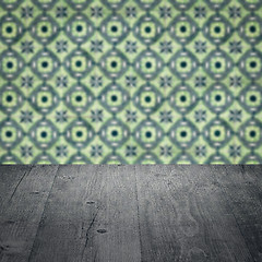 Image showing Wood table top and blur vintage ceramic tile pattern wall