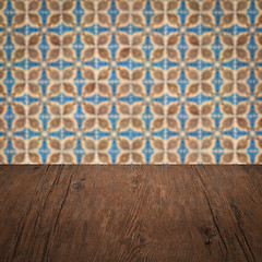 Image showing Wood table top and blur vintage ceramic tile pattern wall