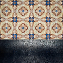 Image showing Wood table top and blur vintage ceramic tile pattern wall