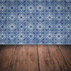 Image showing Wood table top and blur vintage ceramic tile pattern wall