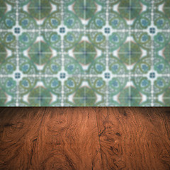 Image showing Wood table top and blur vintage ceramic tile pattern wall