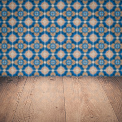 Image showing Wood table top and blur vintage ceramic tile pattern wall