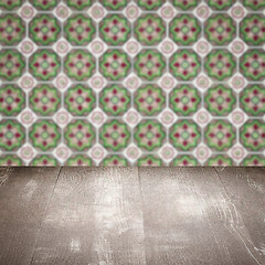 Image showing Wood table top and blur vintage ceramic tile pattern wall