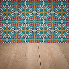 Image showing Wood table top and blur vintage ceramic tile pattern wall