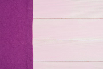 Image showing Purple towel over wooden table