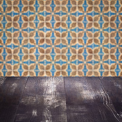 Image showing Wood table top and blur vintage ceramic tile pattern wall