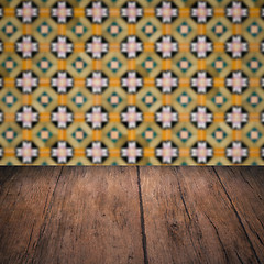 Image showing Wood table top and blur vintage ceramic tile pattern wall