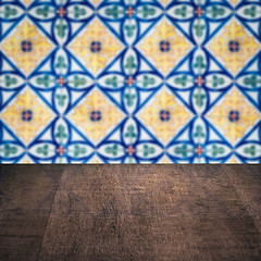 Image showing Wood table top and blur vintage ceramic tile pattern wall