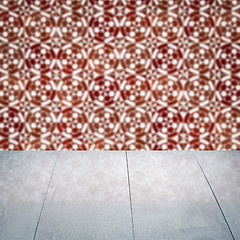 Image showing Wood table top and blur vintage ceramic tile pattern wall