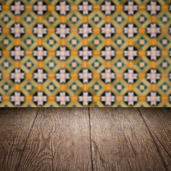 Image showing Wood table top and blur vintage ceramic tile pattern wall