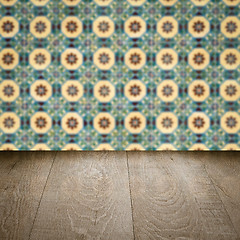 Image showing Wood table top and blur vintage ceramic tile pattern wall