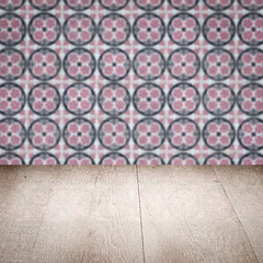 Image showing Wood table top and blur vintage ceramic tile pattern wall