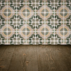 Image showing Wood table top and blur vintage ceramic tile pattern wall