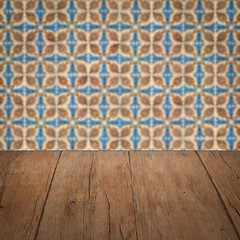 Image showing Wood table top and blur vintage ceramic tile pattern wall