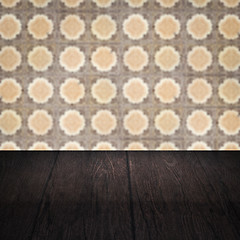 Image showing Wood table top and blur vintage ceramic tile pattern wall