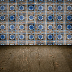 Image showing Wood table top and blur vintage ceramic tile pattern wall