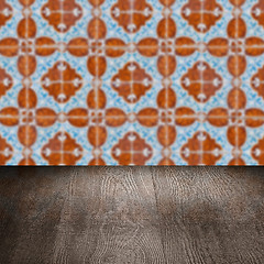 Image showing Wood table top and blur vintage ceramic tile pattern wall