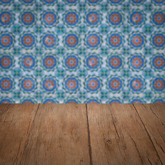 Image showing Wood table top and blur vintage ceramic tile pattern wall